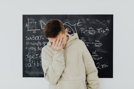 Adolescent face à un problème de maths, moment d'anxiété mathématique